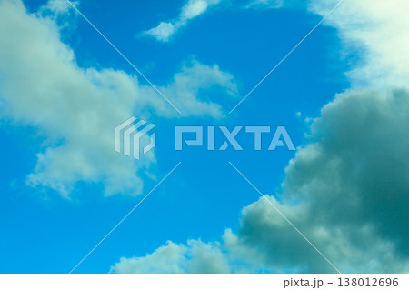 Deep blue sky background with white clouds Deep blue sky background with white clouds 138012696