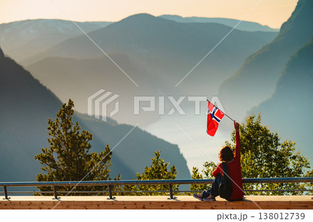 Tourist enjoy fjord view on Stegastein viewpoint Norway Tourist enjoy fjord view on Stegastein viewpoint Norway 138012739