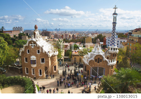 Entrance pavilions of Park Guell and Barcelona city view Entrance pavilions of Park Guell and Barcelona city view 138013015