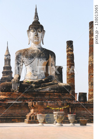 Seated Buddha statue at Wat Mahathat in Sukhothai Historical Park Thailand Seated Buddha statue at Wat Mahathat in Sukhothai Historical Park Thailand 138013065