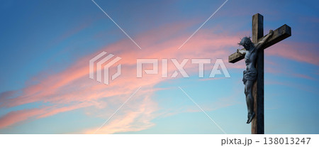 Crucified Christ hangs on the cross Crucified Christ hangs on the cross 138013247