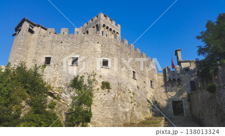 The formidable stone walls and defensive battlements of the Guaita Tower in San Marino 138013324