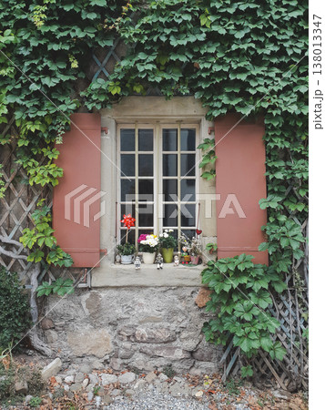 Charming window with red shutters and flowers in Montreux Switzerland Charming window with red shutters and flowers in Montreux Switzerland 138013347