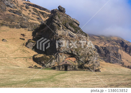 Rutshellir cave opening in a large rock formation in Iceland Rutshellir cave opening in a large rock formation in Iceland 138013852