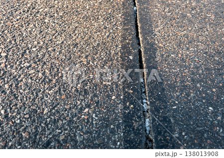 Asphalt Road Surface Expansion Joint Detail Showing Pavement Separation 138013908