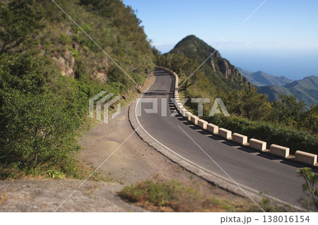 Winding mountain road with ocean views in Anaga Rural Park Tenerife Winding mountain road with ocean views in Anaga Rural Park Tenerife 138016154