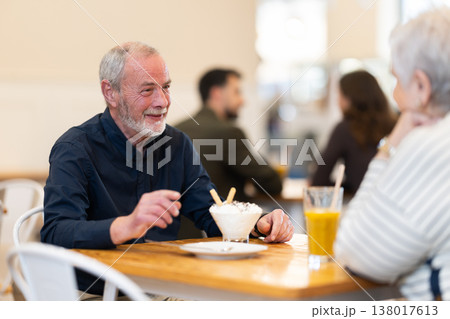 Senior couple spend time in cafe, romantic meeting dating or family time Senior couple spend time in cafe, romantic meeting dating or family time 138017613