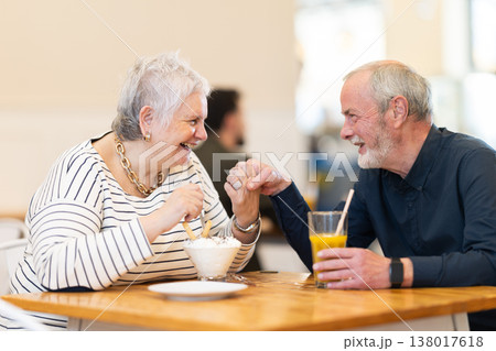 Senior couple spend time in cafe, romantic meeting dating or family time Senior couple spend time in cafe, romantic meeting dating or family time 138017618