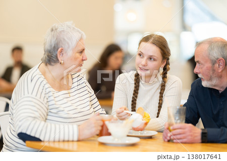 Teenage girl communicates with grandparents 138017641