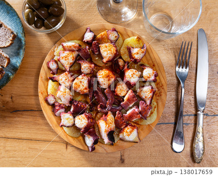 Cooked octopus with potatoes Cooked octopus with potatoes 138017659