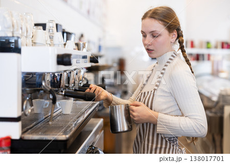 Teen girl coffee shop employee at work 138017701