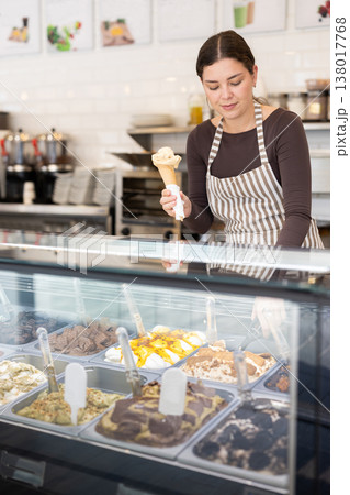 Girl ice cream vendor Girl ice cream vendor 138017768