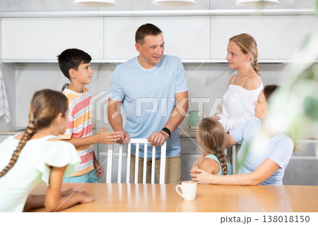 Big family discussing Big family discussing 138018150