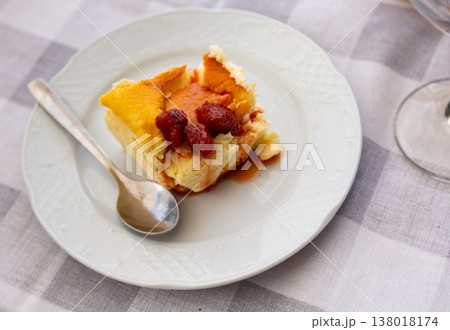 Piece of strawberry cheesecake served for dessert Piece of strawberry cheesecake served for dessert 138018174