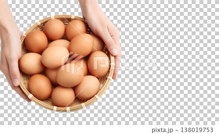 A person showcases a basket overflowing with brown eggs for National Egg Month 138019753