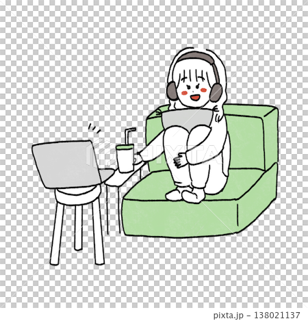 Girl sitting on sofa watching movie with headphones 138021137