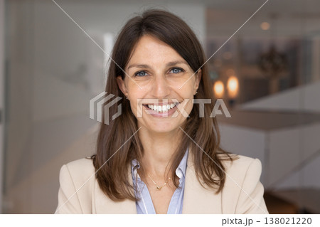 Confident businesswoman close up head shot portrait Confident businesswoman close up head shot portrait 138021220