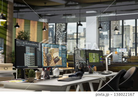 Empty agency with PC monitor showcasing blueprint drafting and 3D modeling software on screen. Digital program emphasizes creative floor plan visualization for layout in a office environment. 138022167