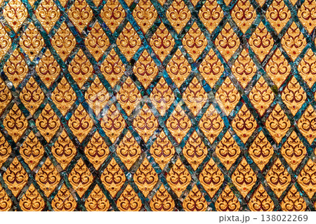 Elegant Thai decorative pattern with glass mosaic details producing a luxurious surface suitable for premium design and cultural backgrounds. 138022269