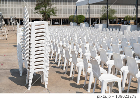 Large scale seating setup with many chairs prepared for an audience in a big event or conference environment. Large scale seating setup with many chairs prepared for an audience in a big event or conference environment. 138022278