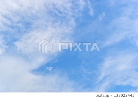 beautiful blue sky and white fluffy group of clouds with sunrise in the morning, natural background 138022443