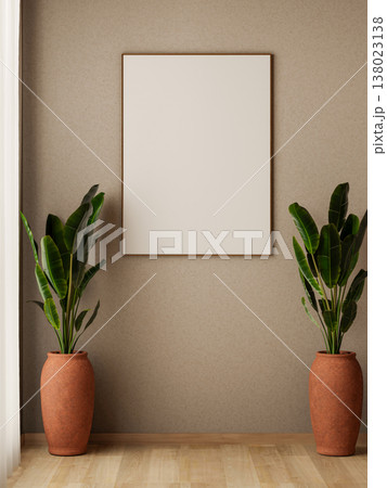 Blank white frame hanging on gallery wall over banana tree in clay pot on wooden parquet floor room Blank white frame hanging on gallery wall over banana tree in clay pot on wooden parquet floor room 138023138