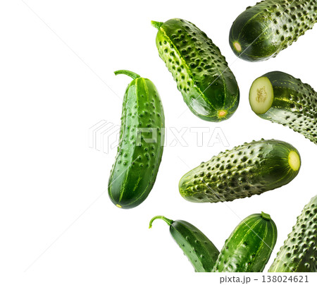 Multiple fresh green cucumbers arranged in a seamless pattern isolated on white background, healthy food and organic produce Multiple fresh green cucumbers arranged in a seamless pattern isolated on white background, healthy food and organic produce 138024621