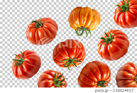 Multiple ripe heirloom tomatoes with ridged textures scattered and on a white background, natural food and healthy eating concept Multiple ripe heirloom tomatoes with ridged textures scattered and on a white background, natural food and healthy eating concept 138024657