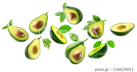 Whole and halved ripe avocados with green leaves, isolated on white background. Concept of fresh organic tropical fruit 138024951