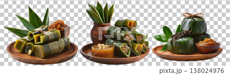 Filipino rice cakes wrapped in banana leaves with sugar sauce on wooden plate, Pandanus fruit paste, isolated on white background Filipino rice cakes wrapped in banana leaves with sugar sauce on wooden plate, Pandanus fruit paste, isolated on white background 138024976