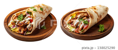 Falafel wrap filled with fresh vegetables and tahini drizzle sauce served on wooden plate, isolated on white, Arabic cuisine Falafel wrap filled with fresh vegetables and tahini drizzle sauce served on wooden plate, isolated on white, Arabic cuisine 138025290