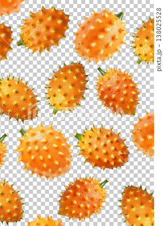 Multiple horned orange kiwano fruits with green tips isolated on white background, concept of exotic fruit freshness 138025528