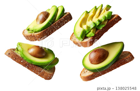Rye toasts topped with avocado, seeds, egg yolk, and herbs, floating against white background, concept of healthy breakfast meal Rye toasts topped with avocado, seeds, egg yolk, and herbs, floating against white background, concept of healthy breakfast meal 138025548