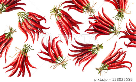 Bunches of red chili peppers with green leaves isolated  on white background, concept of spice and flavor 138025559