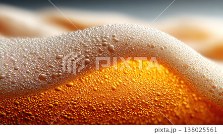 Closeup view of curved beer foam and golden bubbles on warm blurred background, expressing freshness concept Closeup view of curved beer foam and golden bubbles on warm blurred background, expressing freshness concept 138025561