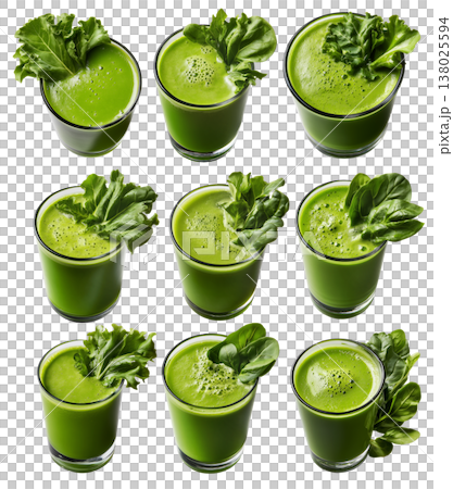 Fresh green smoothie in glass surrounded by lettuce, cucumber, spinach, and apple, isolated on white background 138025594