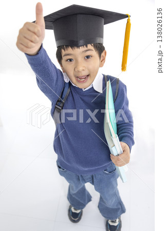 Happy School Boy with Backpack and Books Giving Thumbs Up, 138026136