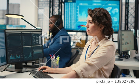 Female advisor in workstation thinking about a new strategy to increase profit and expand the business operations. Businesswoman reviewing data insights for analytics session. Female advisor in workstation thinking about a new strategy to increase profit and expand the business operations. Businesswoman reviewing data insights for analytics session. 138027290