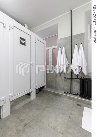 Modern Shared Bathroom in Hostel with White Private WC Cabins 138027485