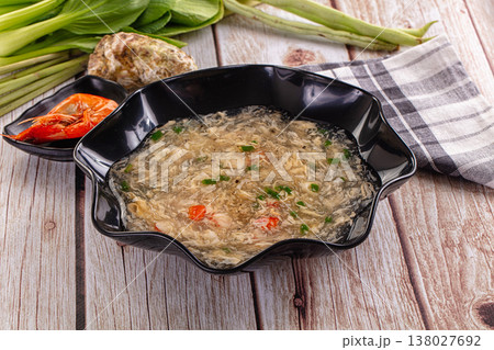 Asian soup with crab and prawn Asian soup with crab and prawn 138027692