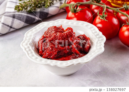 Red organic fresh tomato paste Red organic fresh tomato paste 138027697