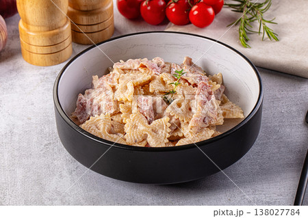 Pasta Carbonara - farfalle with bacon Pasta Carbonara - farfalle with bacon 138027784