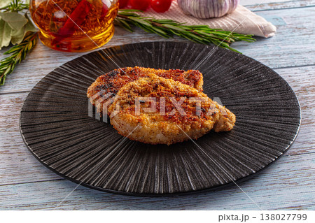 Breaded meat fillet escalope schnitzel Breaded meat fillet escalope schnitzel 138027799
