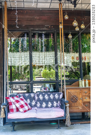 Wooden swing bench decoration 138028283