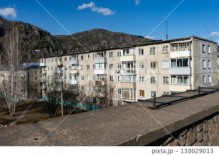 A five story panel apartment building in spring. 138029013