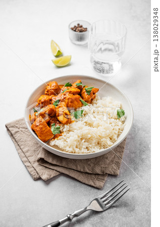 Chicken tikka masala curry with rice on marble background Chicken tikka masala curry with rice on marble background 138029348