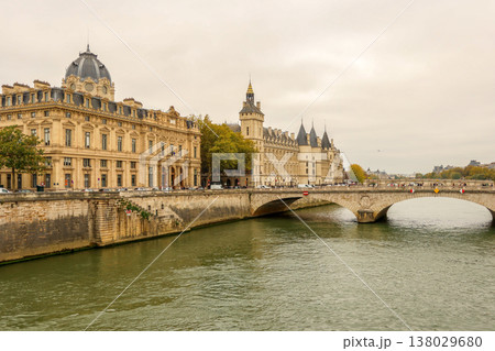 Seine River flowing past the Conciergerie and Tribunal de Commerce building on an autumn day in Paris, France 138029680