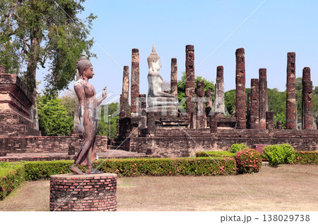Ancient stone Buddha statue and ruins of ancient temple Wat Tra Phang So, Sukhothai historical park. Picturesque scene in Sukhothai old city, Northern Thailand. Topic of vacation, travel, trip, tour 138029738