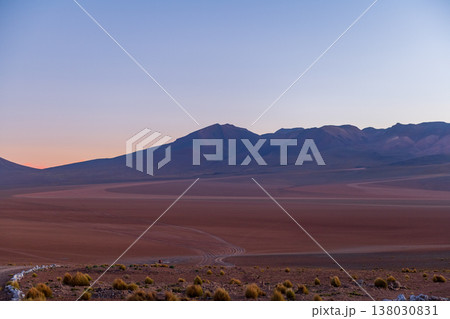 Serene desert mountain landscape under tranquil twilight sky in Andes 138030831