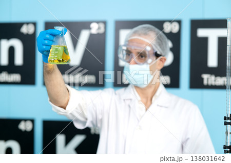 The lab team is looking at the chemicals and the mixing 138031642